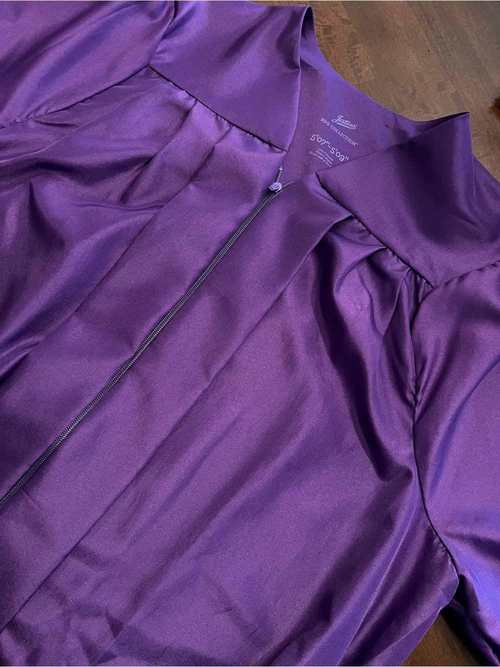Dark purple commencement ceremony gown. Great for senior photos
